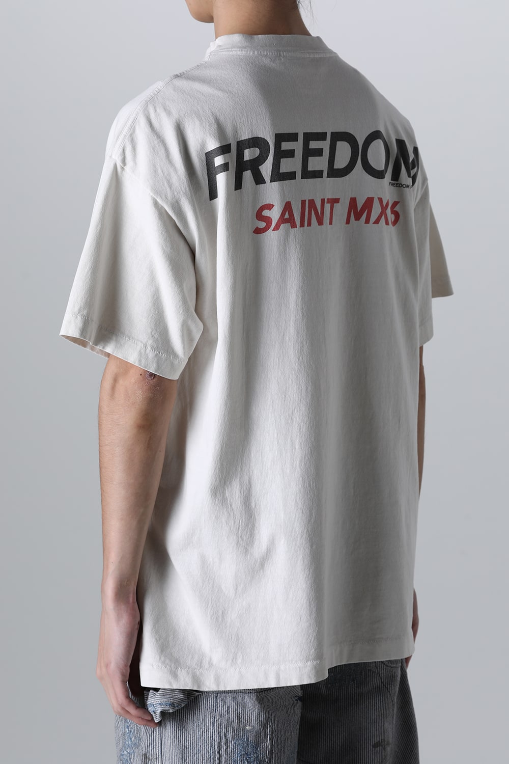FREEDOM × SAINT Mxxxxxx ASTRO Short sleeve T-shirt