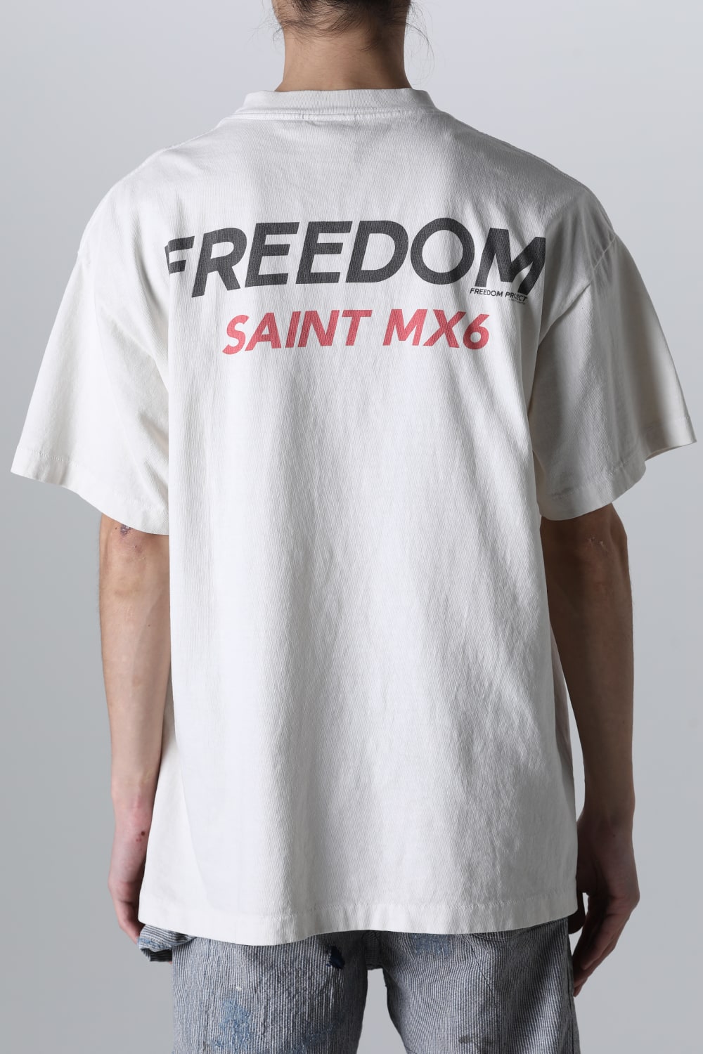 FREEDOM × SAINT Mxxxxxx ASTRO Short sleeve T-shirt