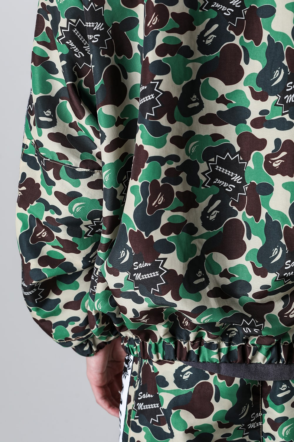 A BATHING APE® × SAINT Mxxxxxx STAPE Track Jacket