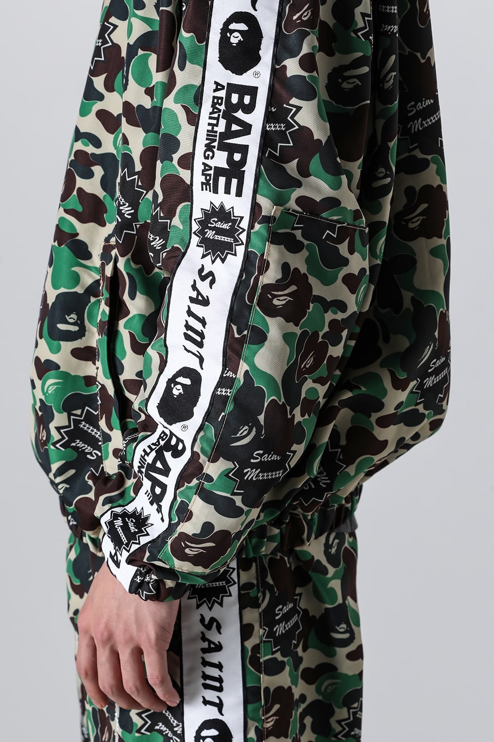 A BATHING APE® × SAINT Mxxxxxx STAPE Track Jacket