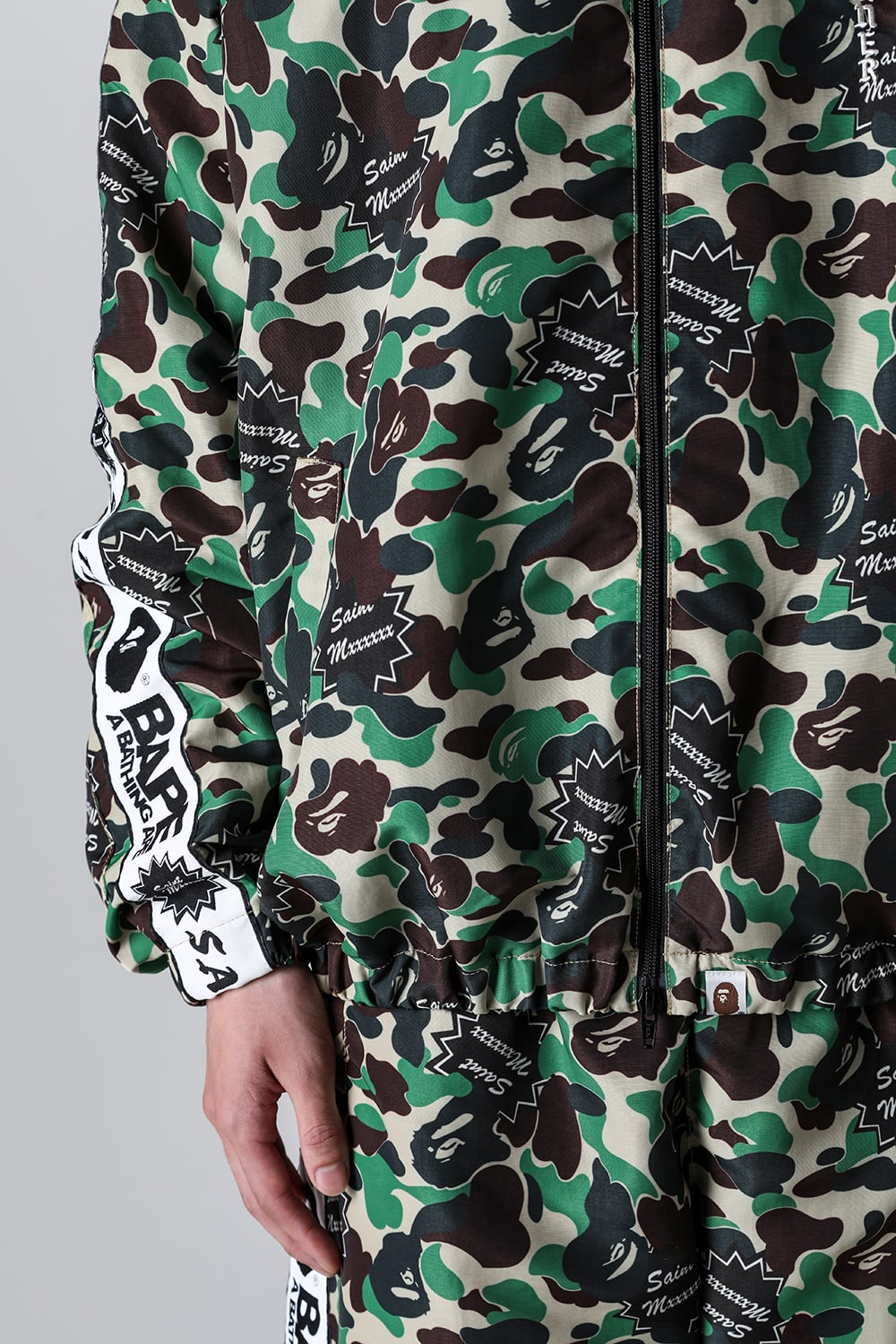 A BATHING APE® × SAINT Mxxxxxx STAPE Track Jacket