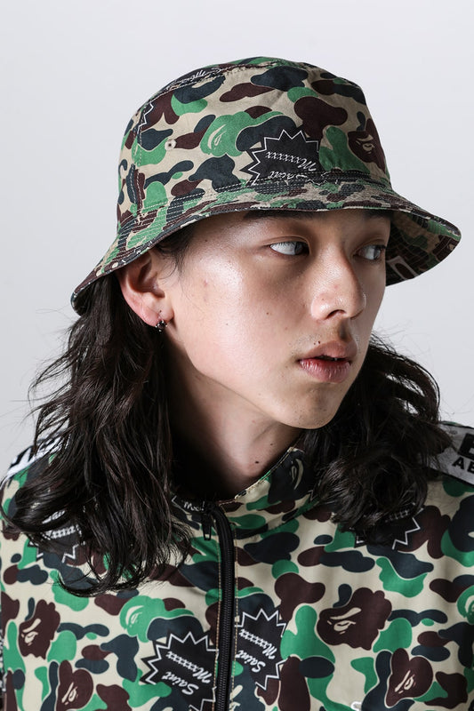 A BATHING APE® × SAINT Mxxxxxx Bucket Hat