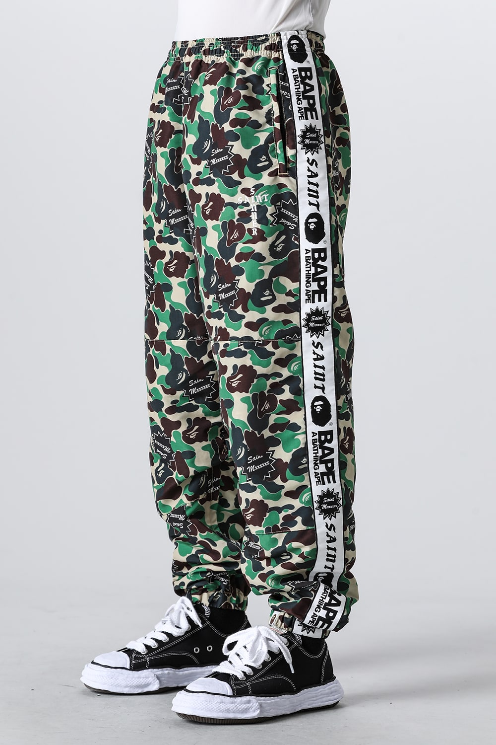 A BATHING APE® × SAINT Mxxxxxx STAPE Track Pants