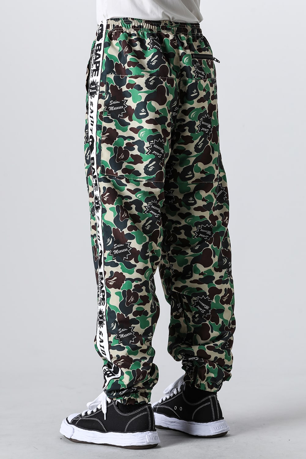 A BATHING APE® × SAINT Mxxxxxx STAPE Track Pants