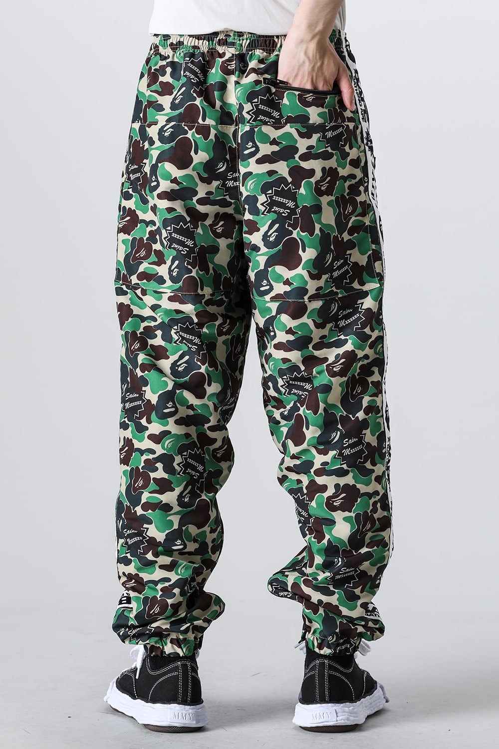 A BATHING APE® × SAINT Mxxxxxx STAPE Track Pants