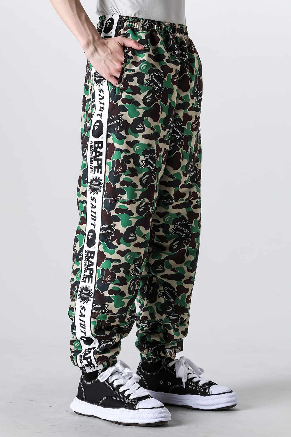 A BATHING APE® × SAINT Mxxxxxx STAPE Track Pants