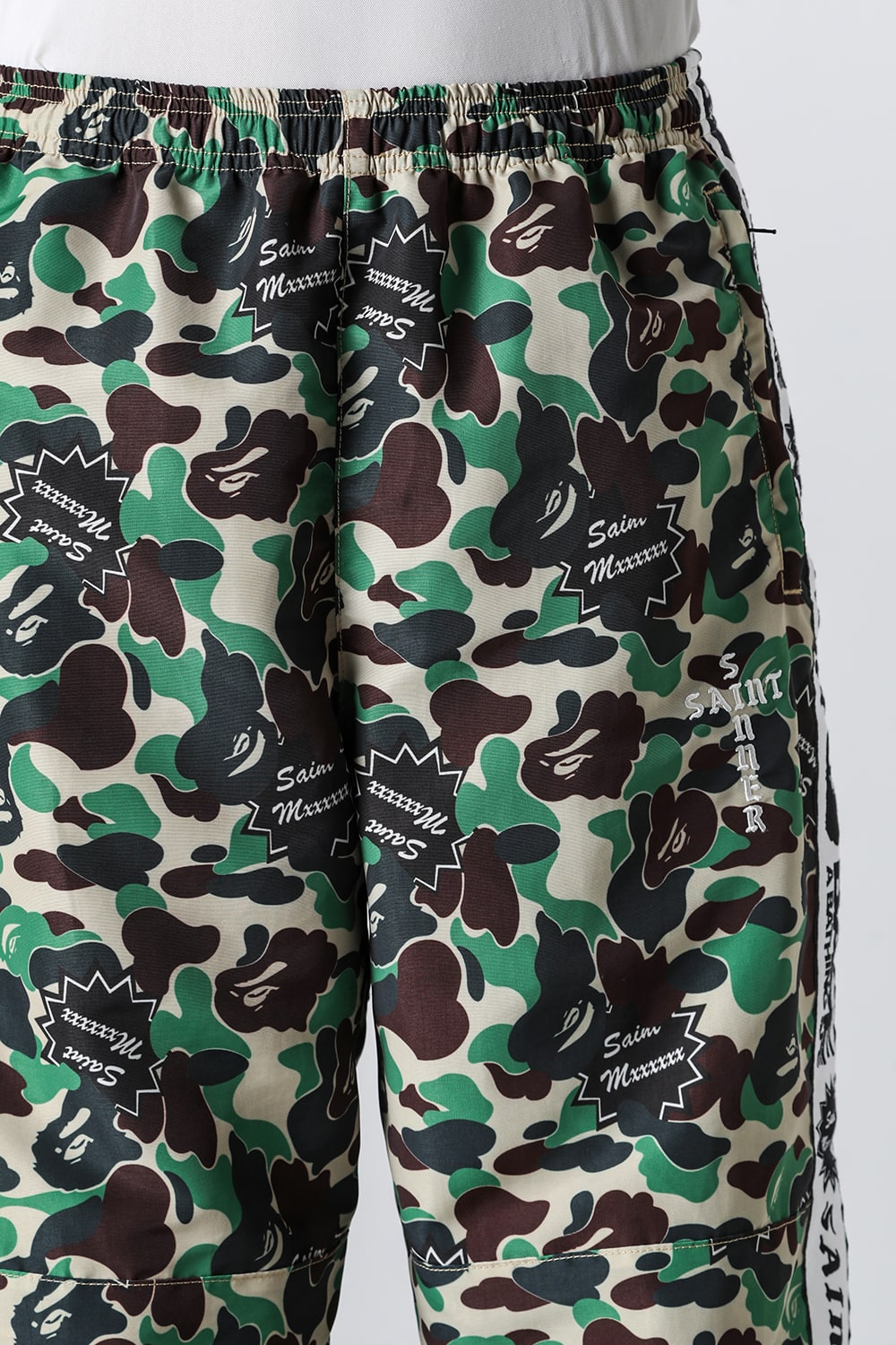 A BATHING APE® × SAINT Mxxxxxx STAPE Track Pants