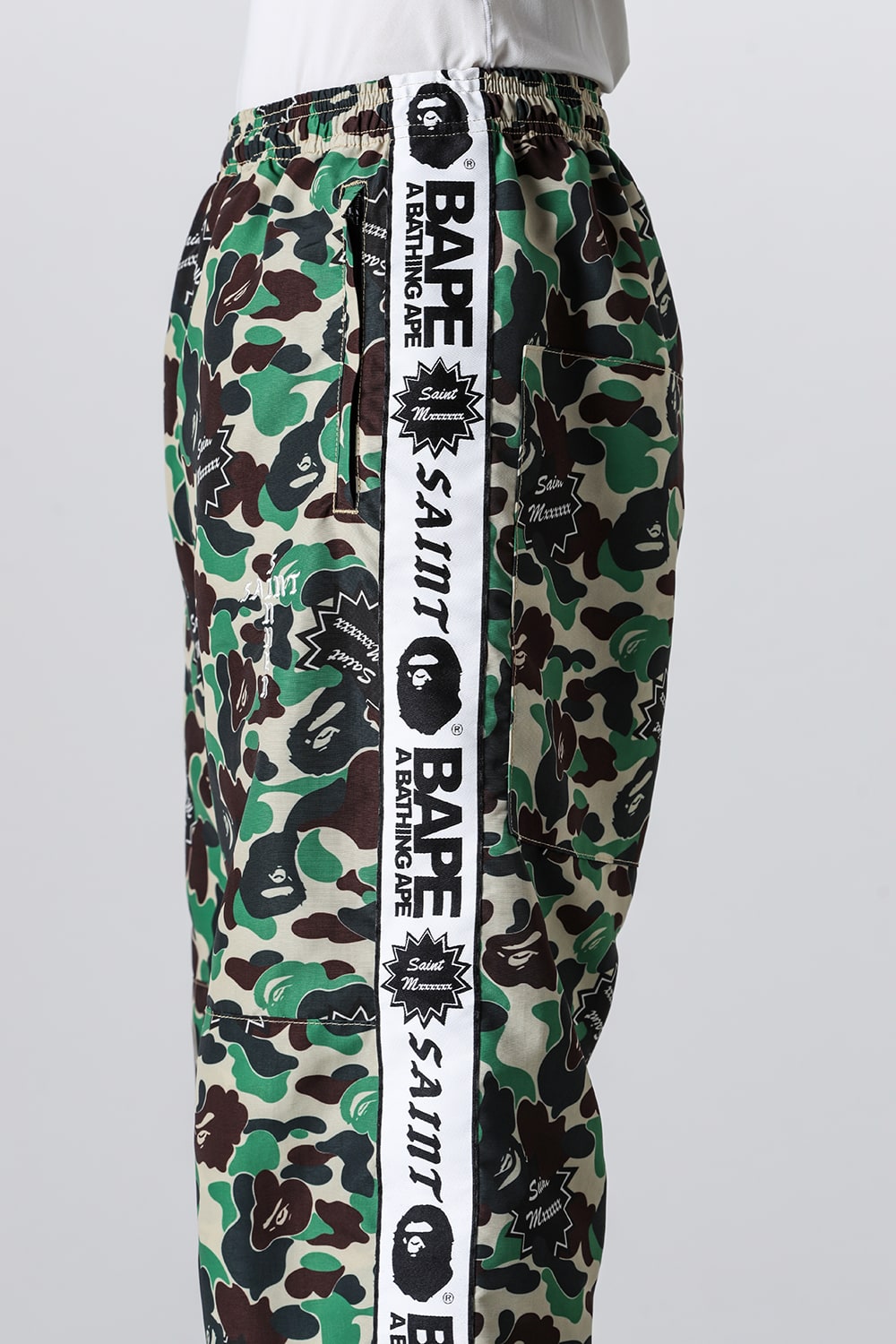 A BATHING APE® × SAINT Mxxxxxx STAPE Track Pants