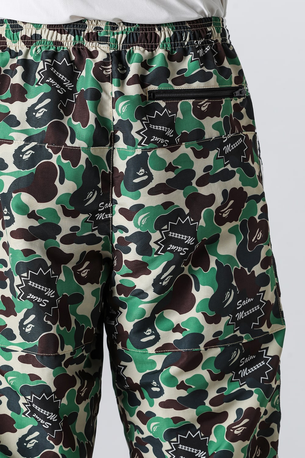 A BATHING APE® × SAINT Mxxxxxx STAPE Track Pants