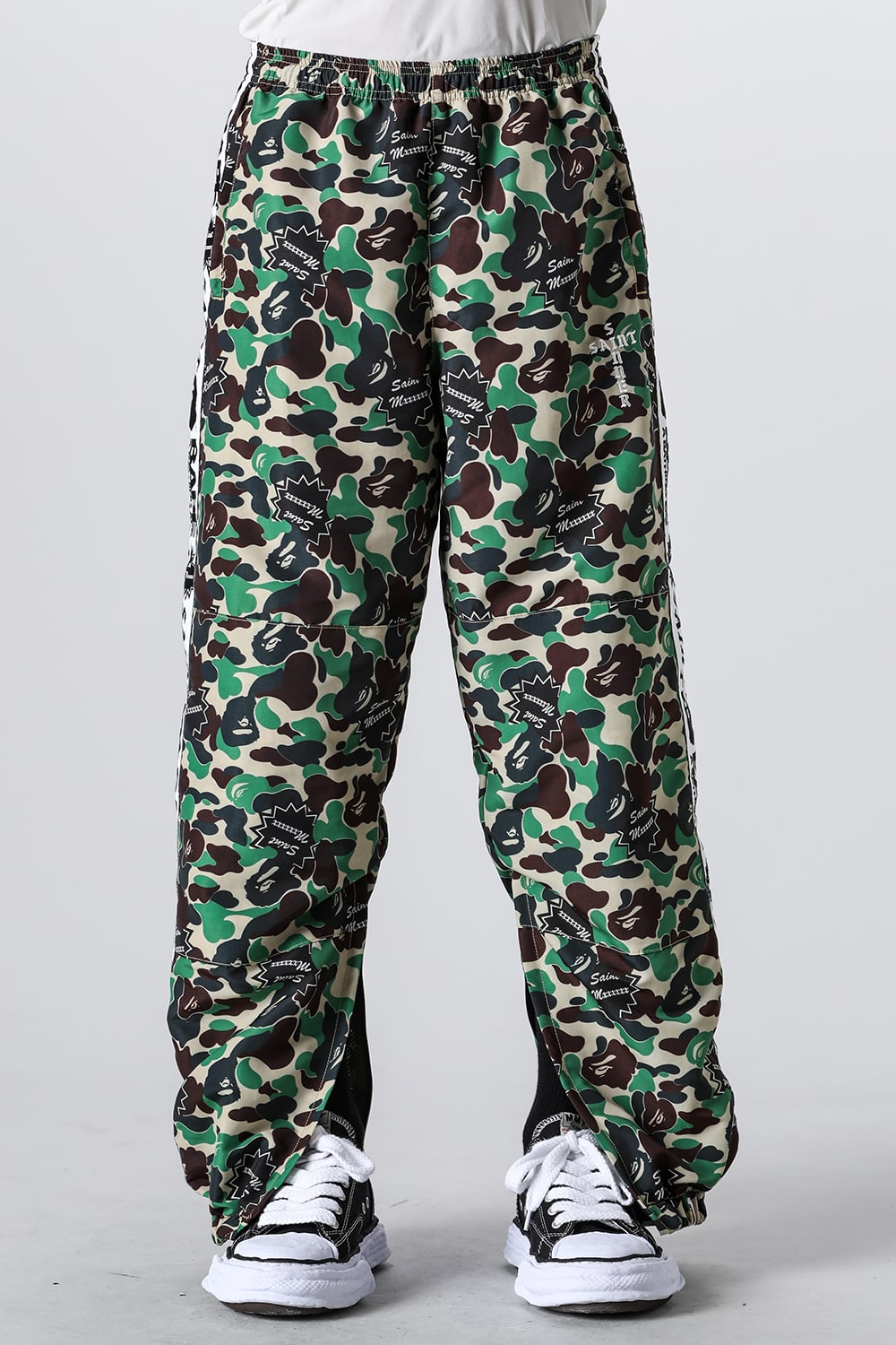 A BATHING APE® × SAINT Mxxxxxx STAPE Track Pants