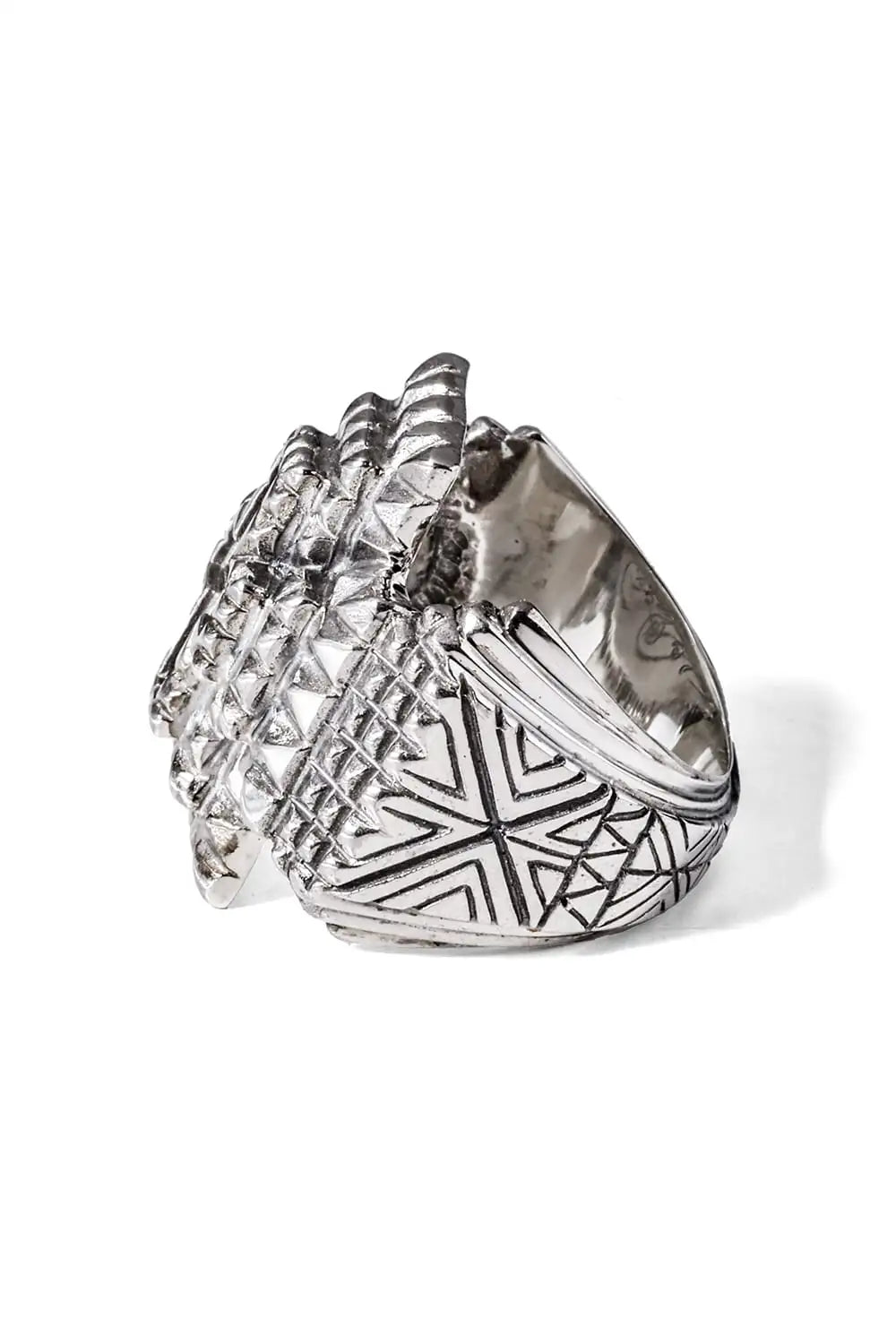 Roots of the cross Ring