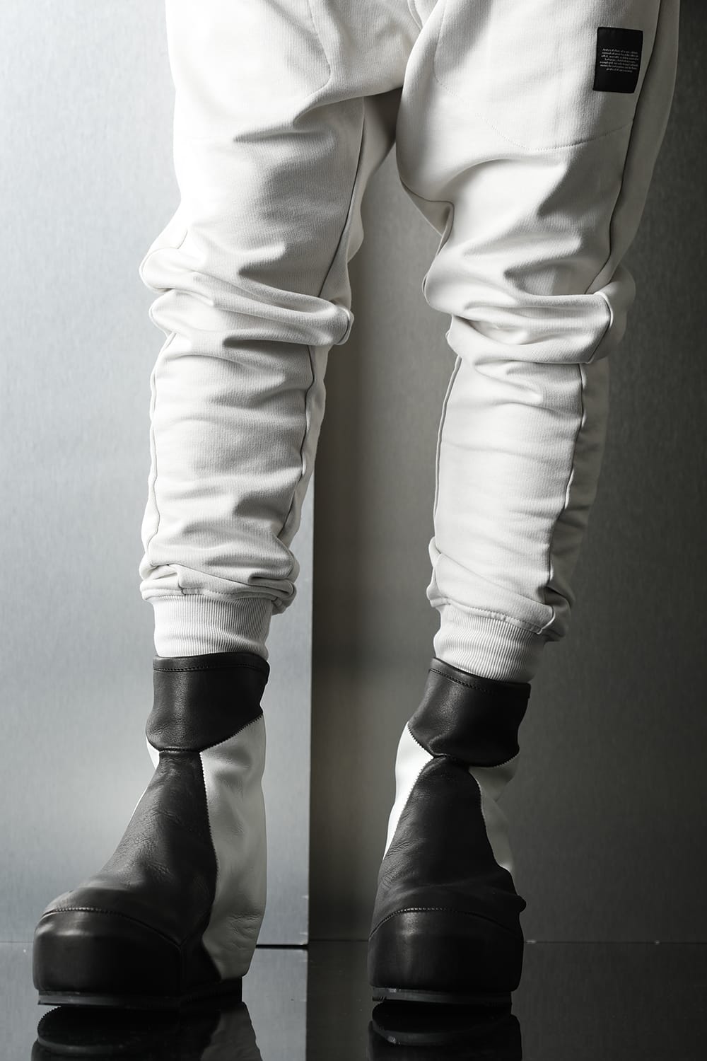 Prism In heeled boots Black × White