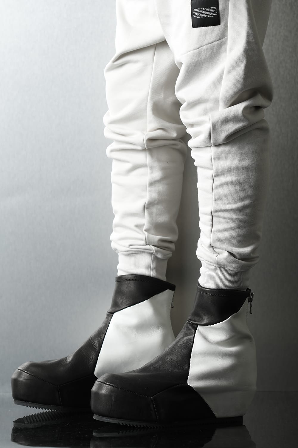 Prism In heeled boots Black × White