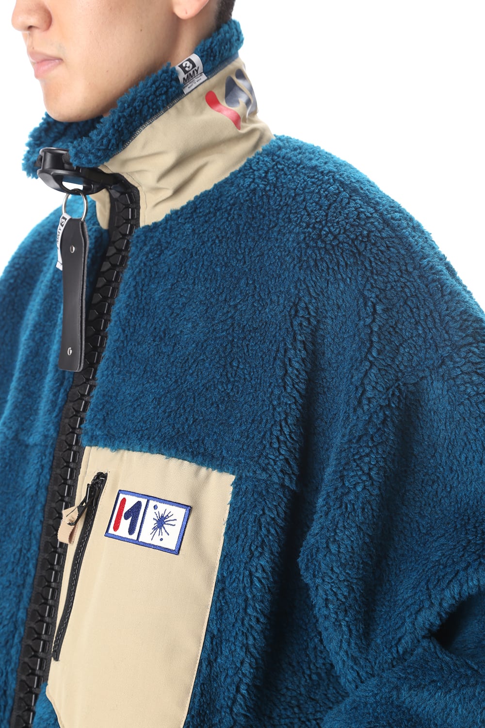 Enlarged zip Boa blouson Blue