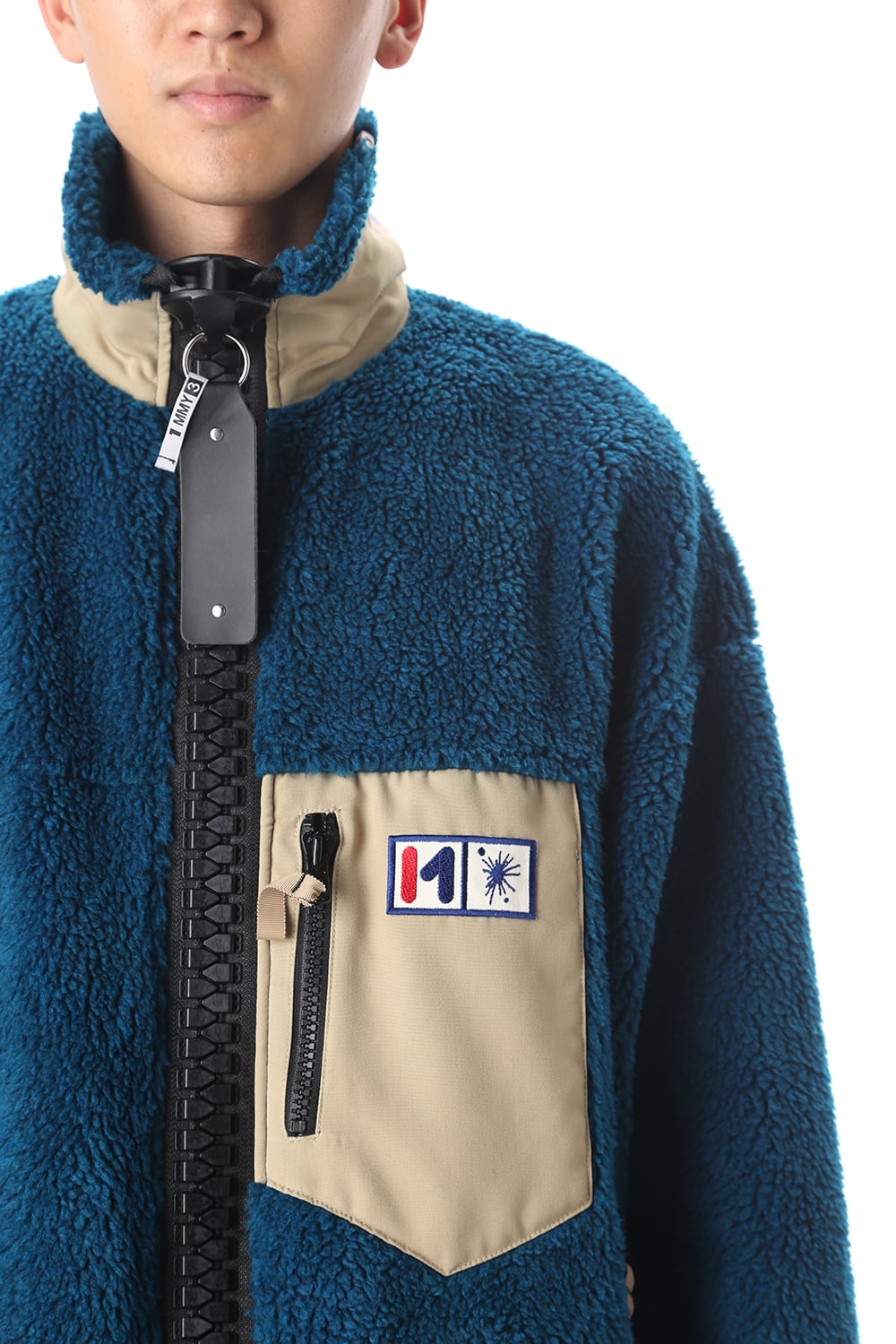 Enlarged zip Boa blouson Blue