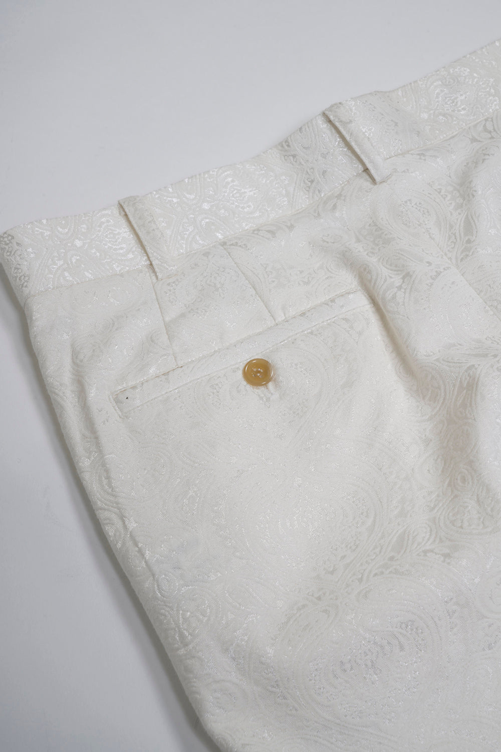 シャイニー オーナメントジャガード ファスナースリットパンツ クリーム