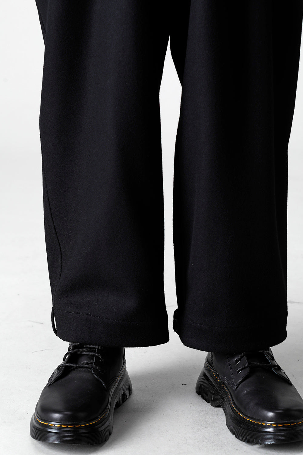 COMPRESSED MELTON FRINGE SUSPENDER PANTS