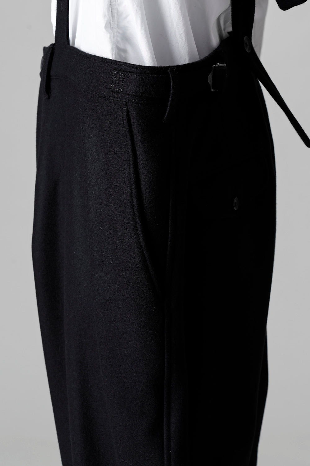 COMPRESSED MELTON FRINGE SUSPENDER PANTS