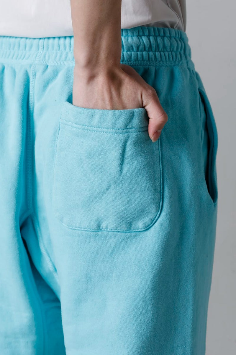 SAINT スウェットパンツ ブルー