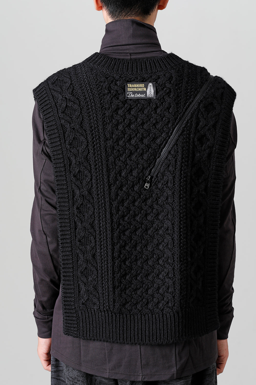 reverse double zip aran pattern vest Black