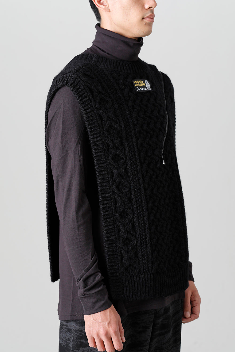 reverse double zip aran pattern vest Black