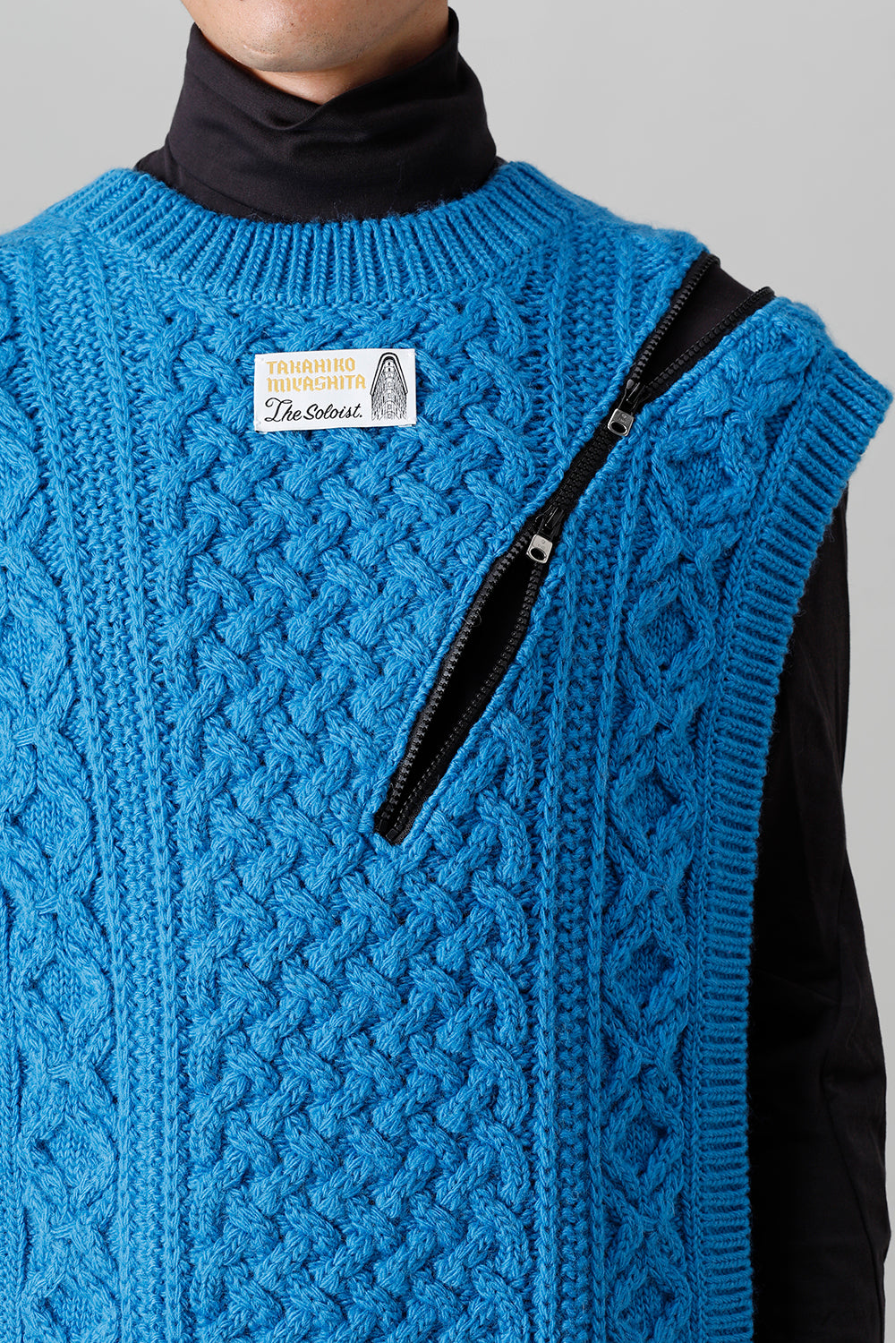 reverse double zip aran pattern vest L.Blue