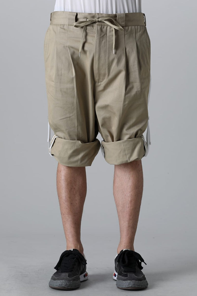 side tape adjustable length 2 tucks work pant. Khaki x White