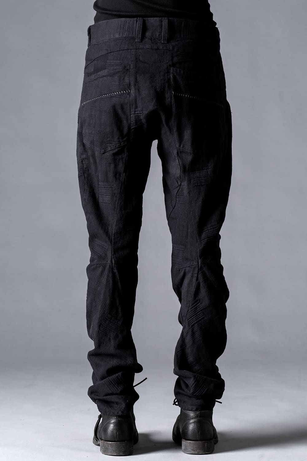 ハイパーストレッチコットンデニムオーバーロックツイストカーブスリムパンツ  チャコール