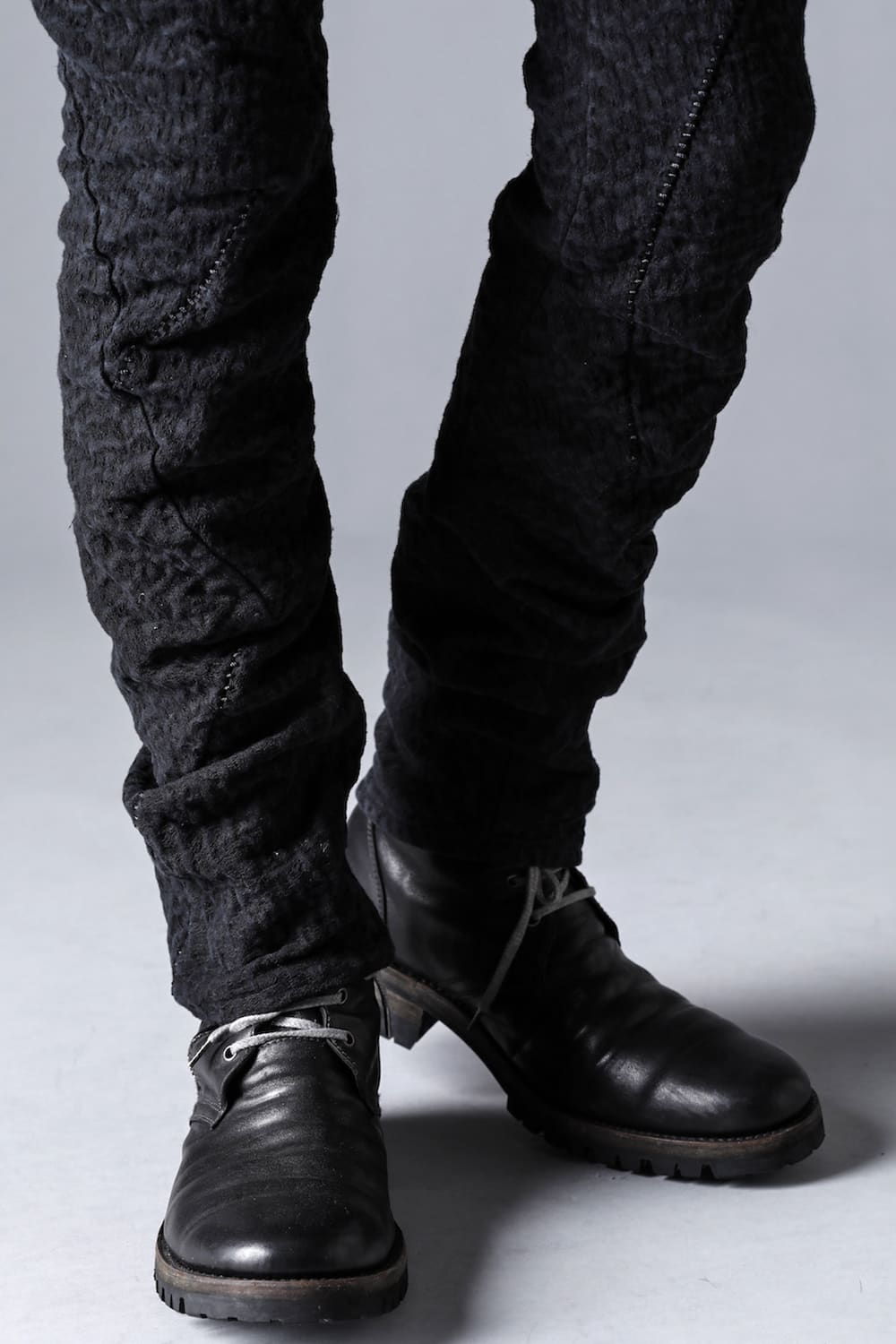 Scab Jagged Stretch Cotton Denim Overlock Twisted Curved Slim Pants