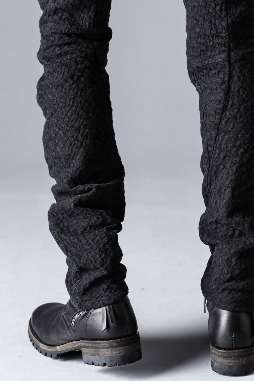 Scab Jagged Stretch Cotton Denim Overlock Twisted Curved Slim Pants