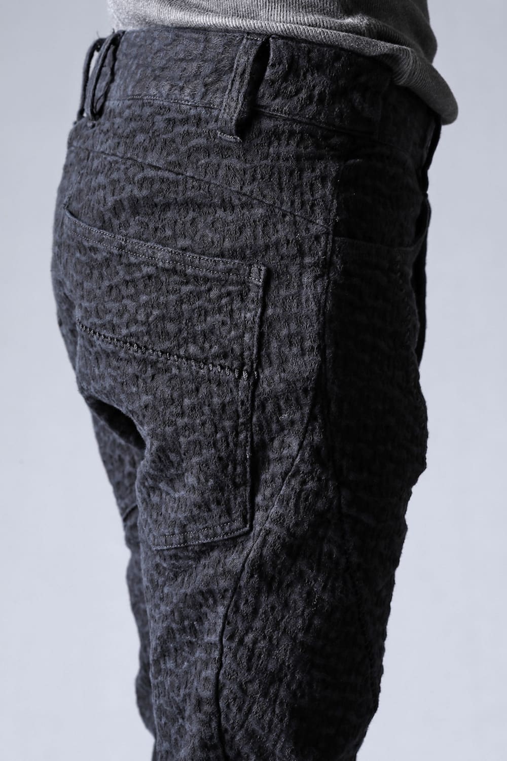 Scab Jagged Stretch Cotton Denim Overlock Twisted Curved Slim Pants