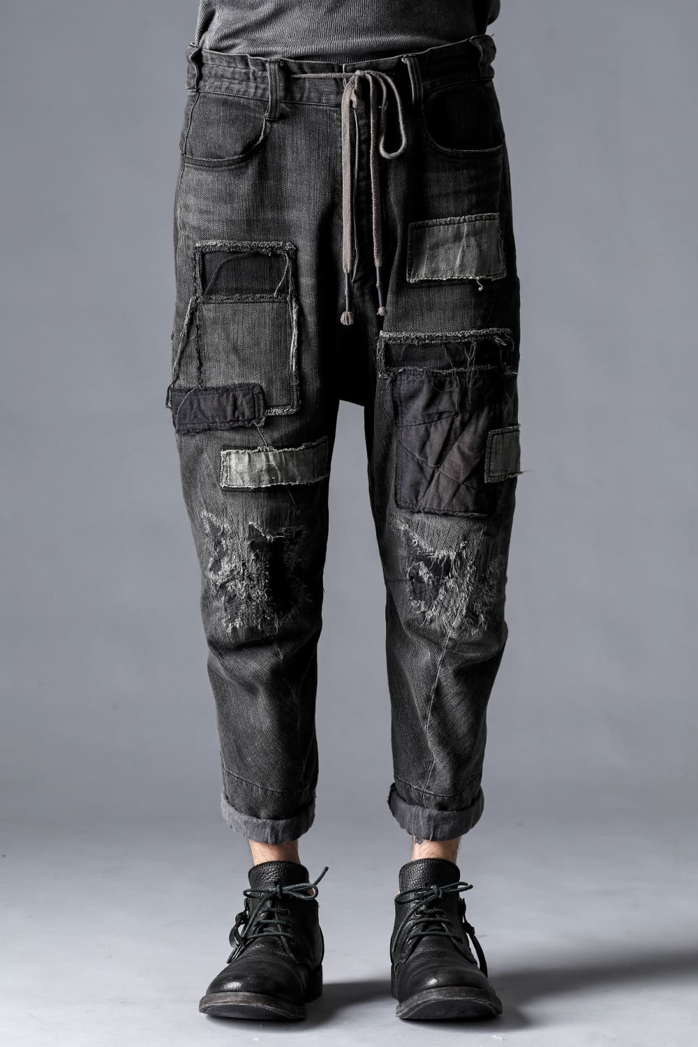 Damage Repair Curved Tapered Drop Crotch Denim Pants