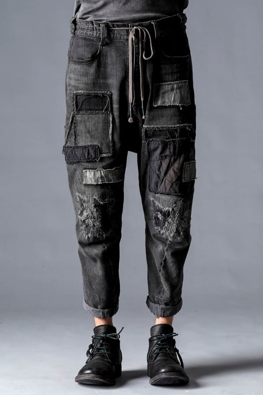 Damage Repair Curved Tapered Drop Crotch Denim Pants