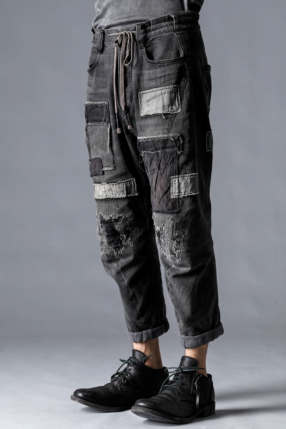 Damage Repair Curved Tapered Drop Crotch Denim Pants