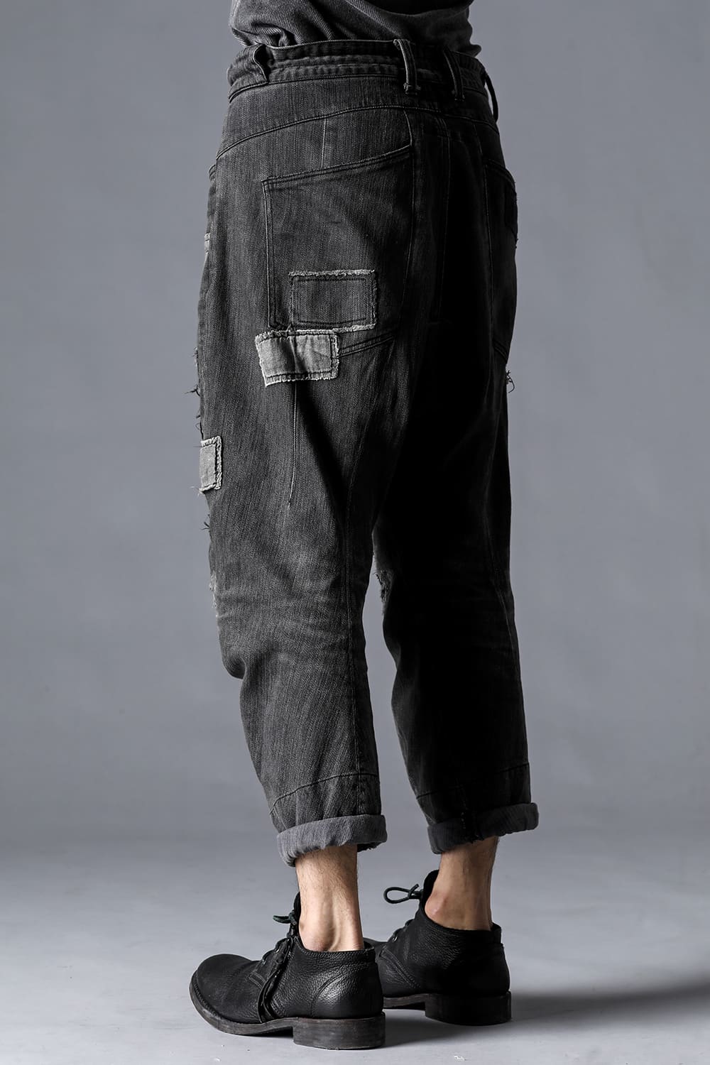 Damage Repair Curved Tapered Drop Crotch Denim Pants