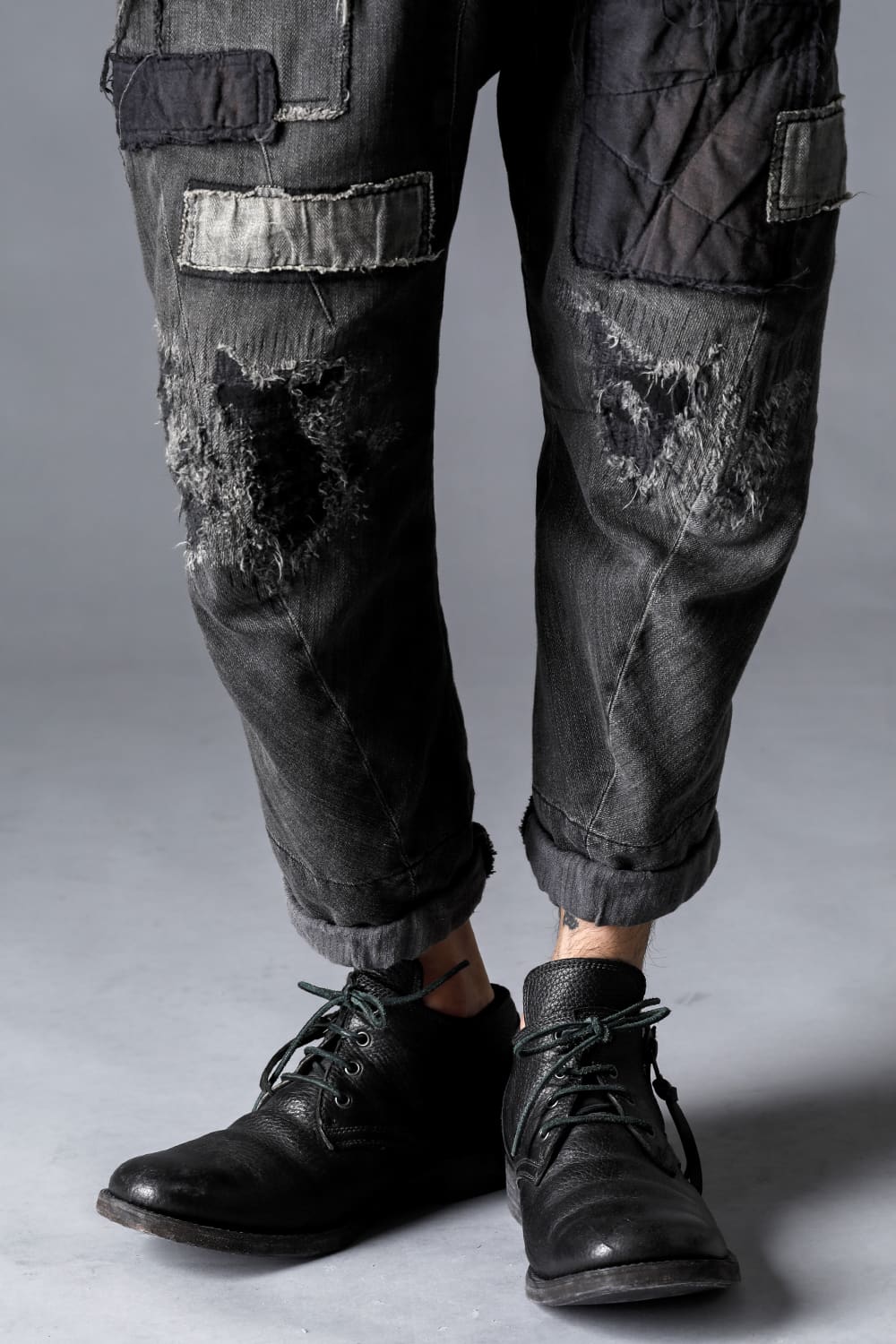 Damage Repair Curved Tapered Drop Crotch Denim Pants