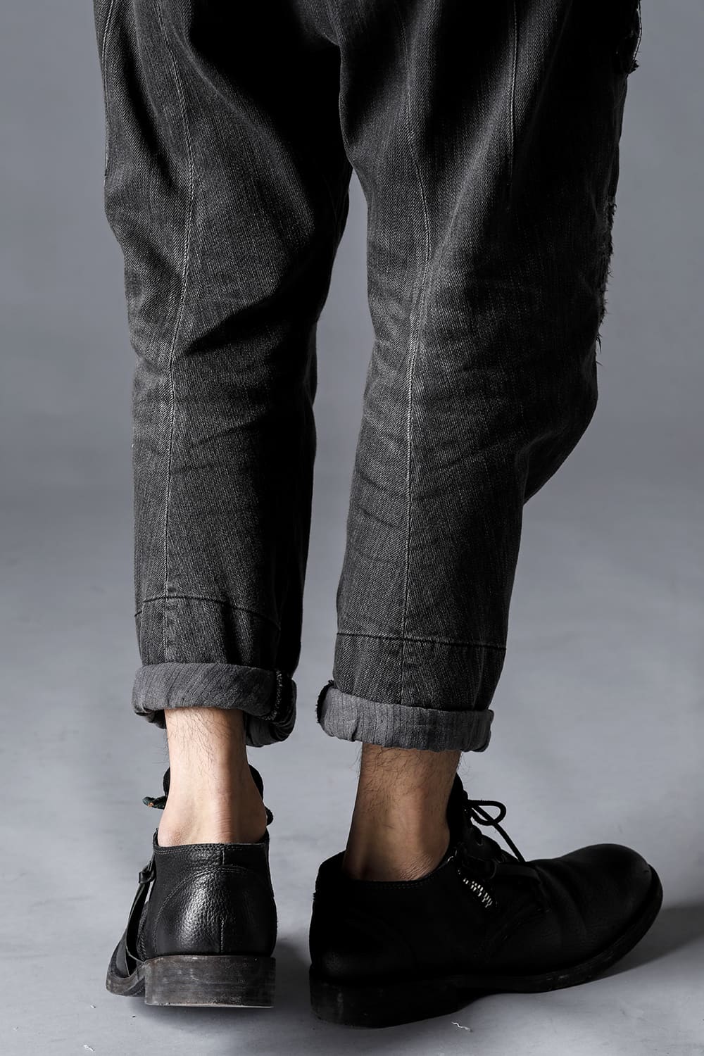 Damage Repair Curved Tapered Drop Crotch Denim Pants
