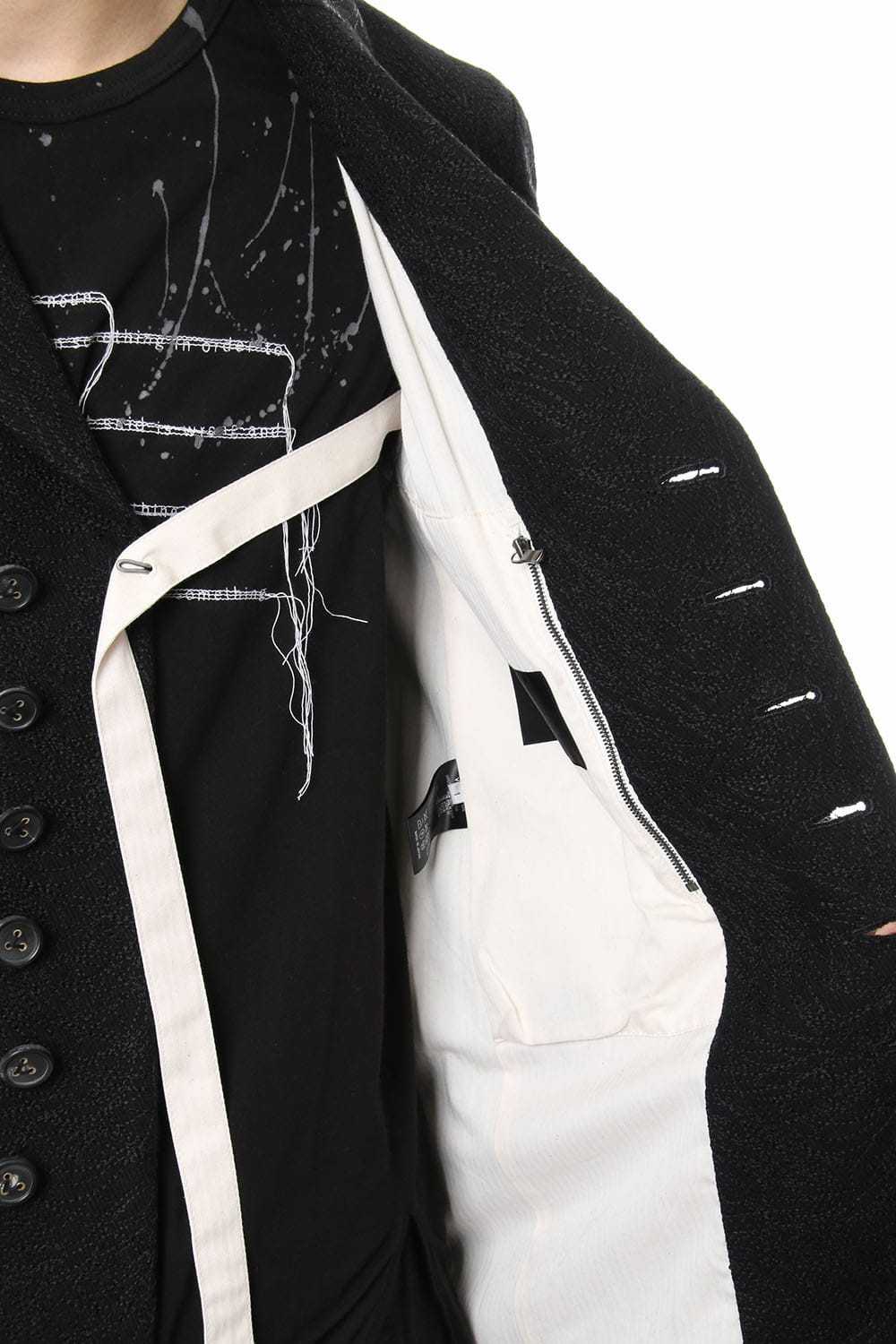 Embroidery joining chester coat