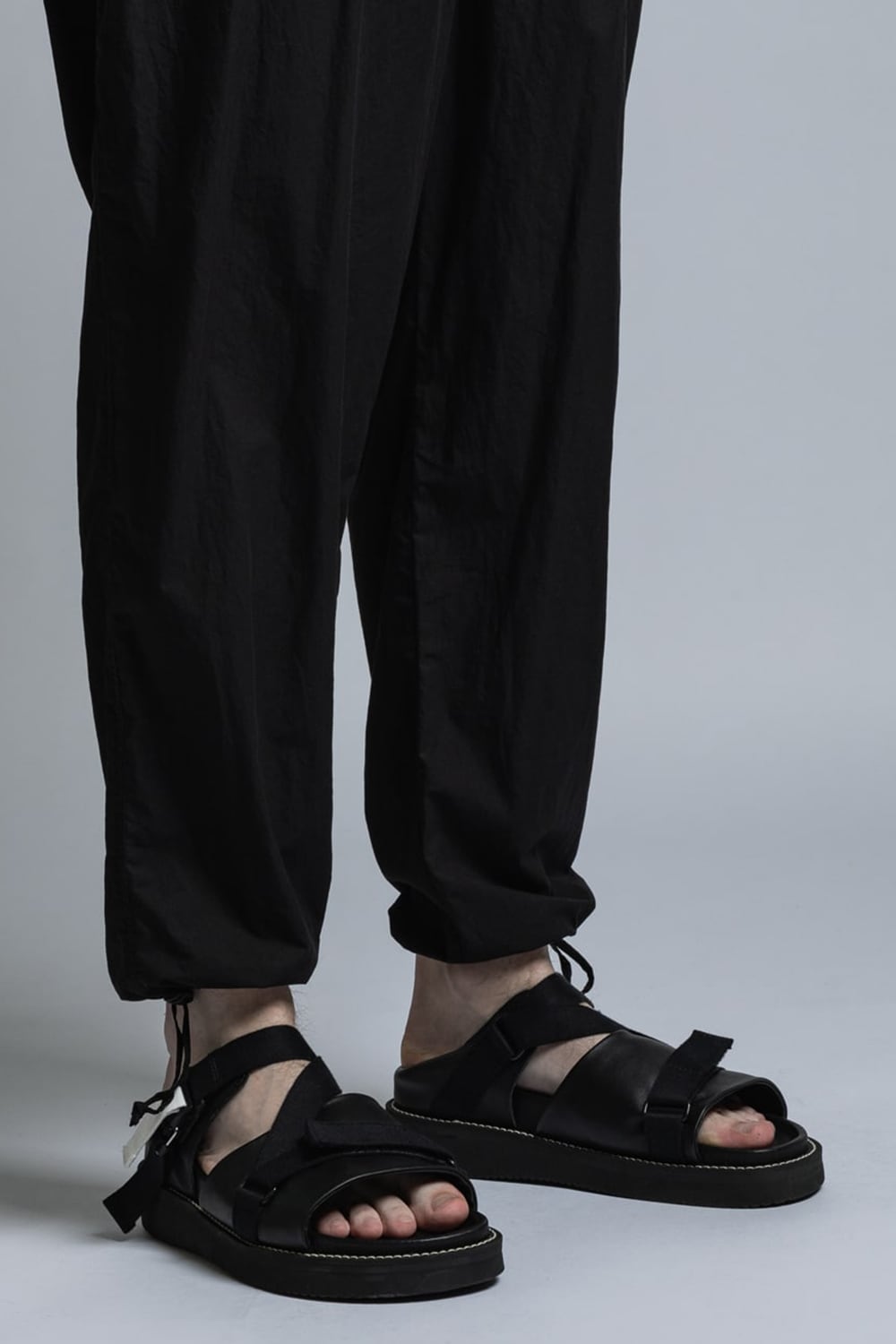 Compact Twill Hem Strap Pants